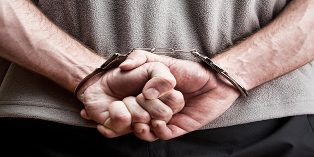 handcuffs on caucasian male