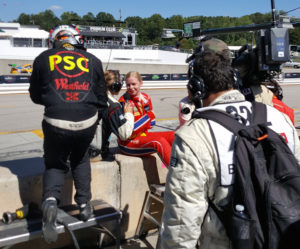 History-making Ferrari driver Christina Nielsen speaks with Fox Sports during the Petit Le Mans. - Photo by Chip Harp