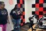 Three people podcasting in a small studio