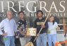 Students showcasing woodworking projects at college