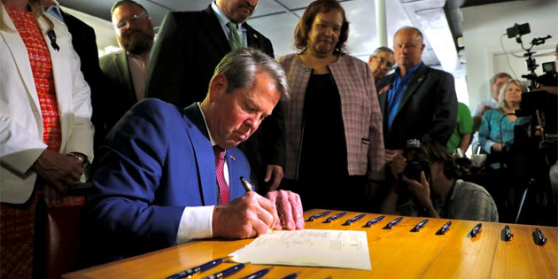 Kemp signs largest income tax cut in Georgia history