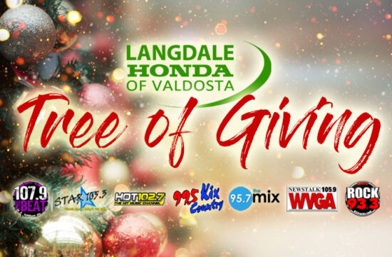 Christmas tree with festive radio station logos.