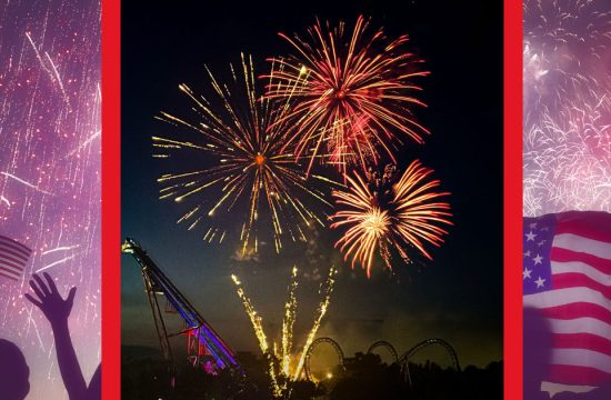 Fireworks over amusement park with American flags